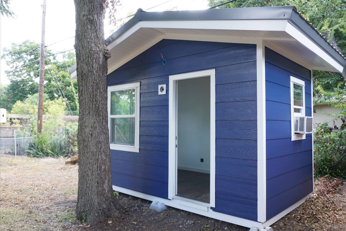 Custom navy-blue backyard shed